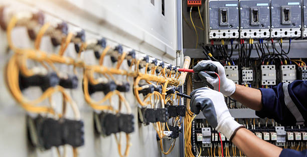 Professional Electrician technician working in Downs, IL